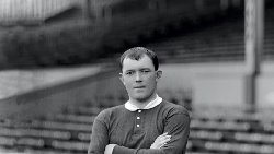 Who scored the first goal at Old Trafford?